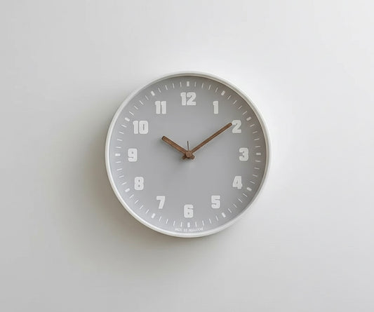 Minimalist bamboo wall clock with silent quartz movement and glass face