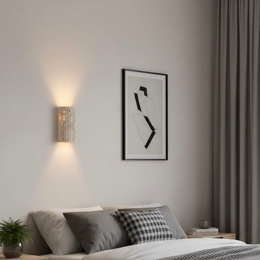 Natural stone LED wall sconce with warm ambient lighting