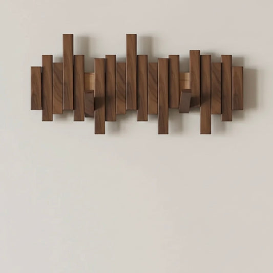Elegant wooden wall-mounted coat hook with minimalist design for coats, bags, and accessories
