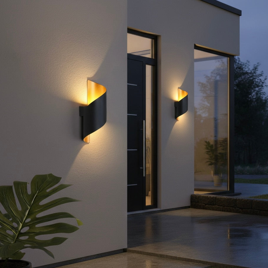 Artistic ModernCurl LED wall light providing soft, energy-efficient illumination