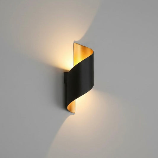 Artistic ModernCurl LED wall light providing soft, energy-efficient illumination