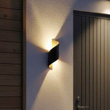 Artistic ModernCurl LED wall light providing soft, energy-efficient illumination