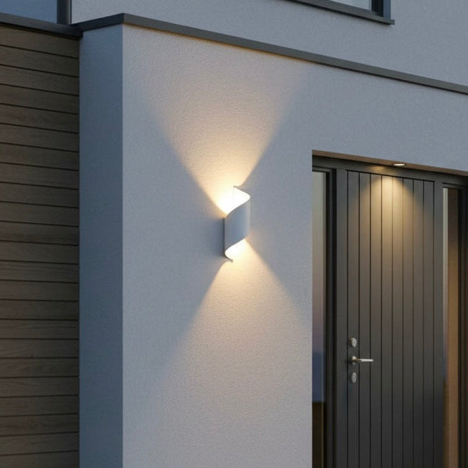 Artistic ModernCurl LED wall light providing soft, energy-efficient illumination