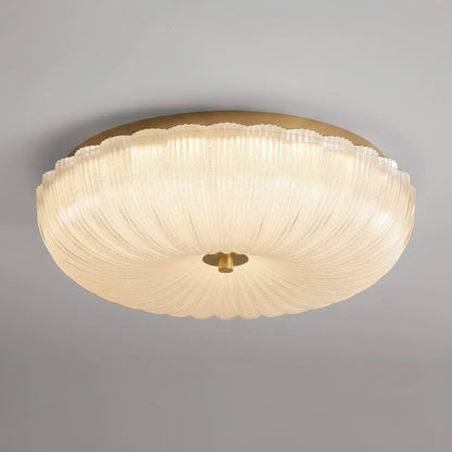 RippleGlow flush mount ceiling light featuring elegant textured glass for refined indoor illumination.