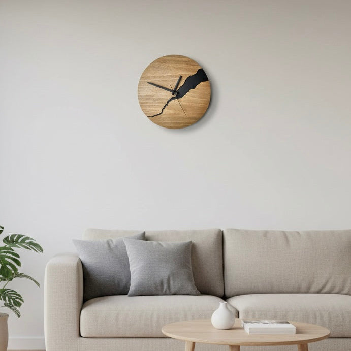 Natural wood texture on a minimalist wall clock hanging in a modern living room