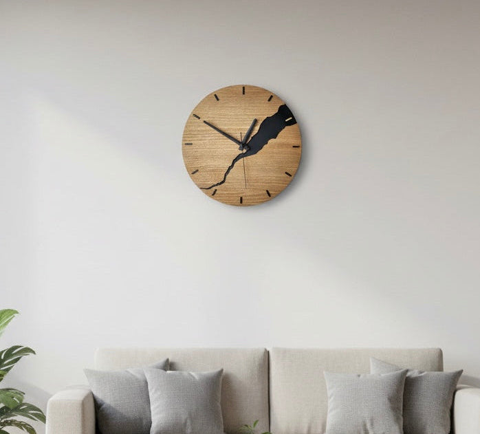 Wooden wall clock shown on a wall to illustrate size and proportions