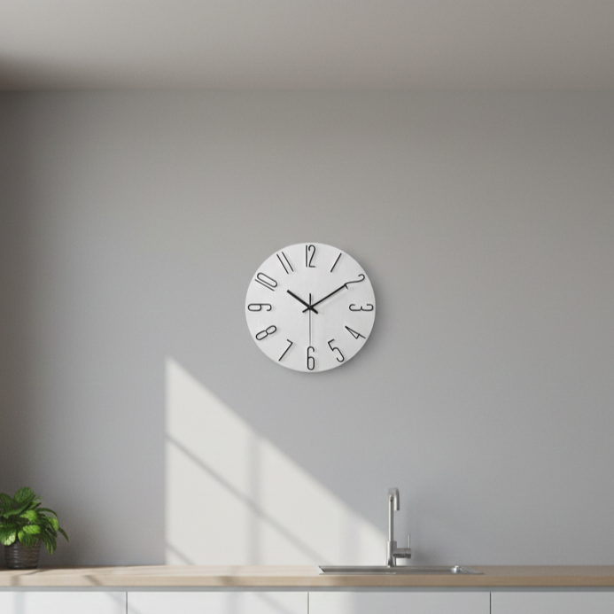 Scandinavian wall clock mounted on wall in modern kitchen, highlighting minimalist and design